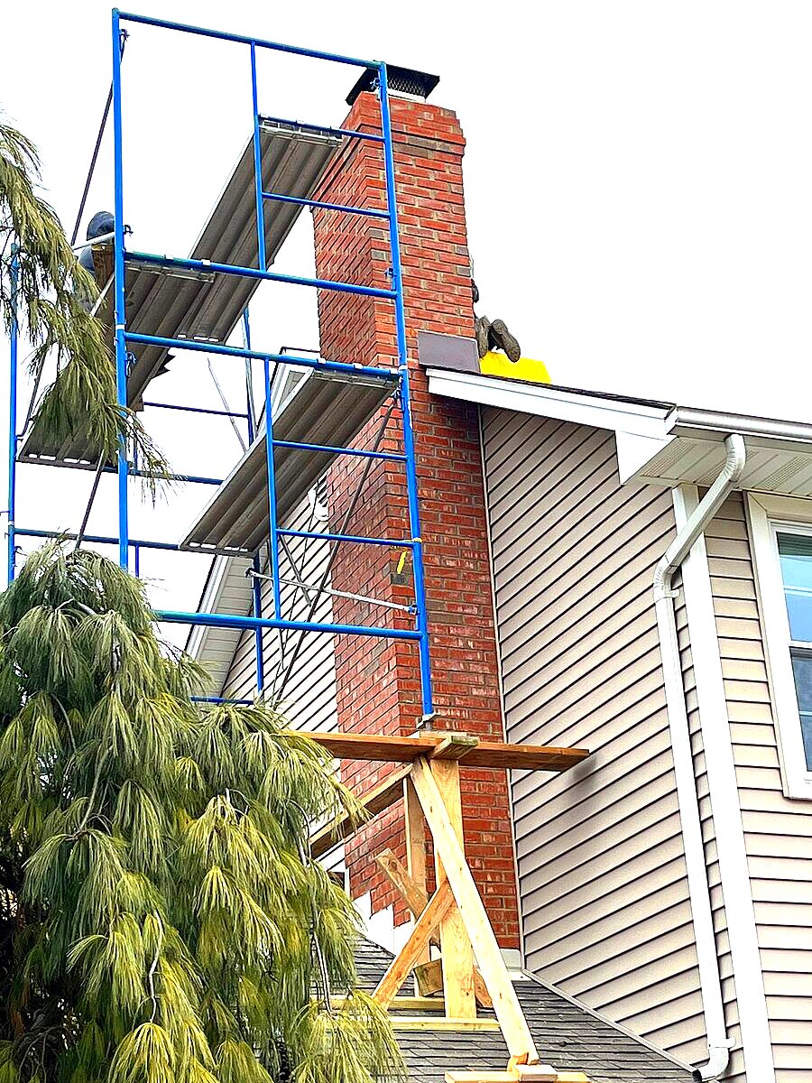 Chimney rebuild reference for discussing extensive masonry deterioration