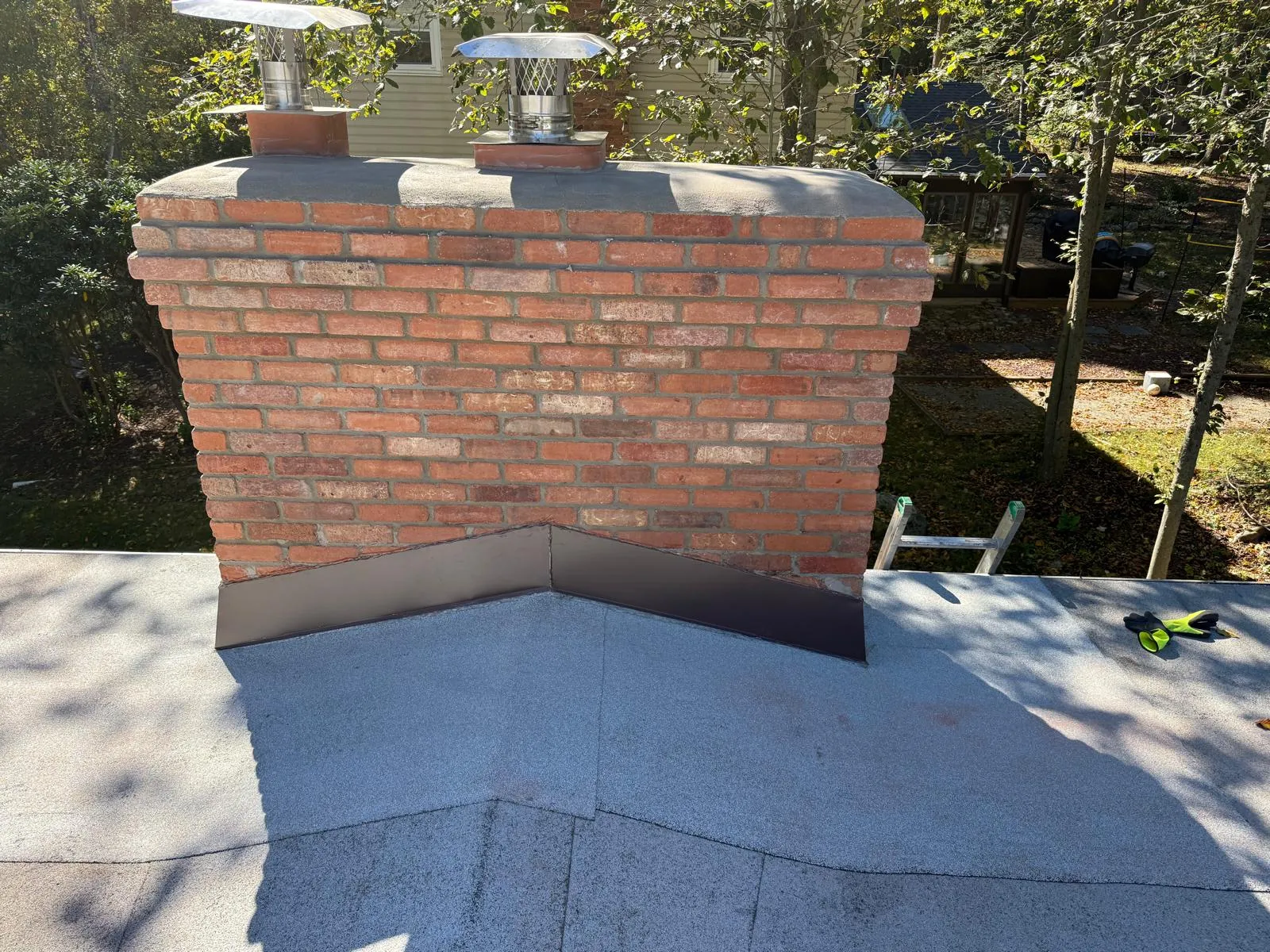 Finished chimney crown surrounding the flue openings