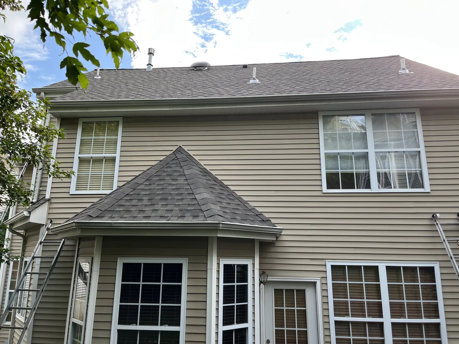 Residential home with an asphalt shingle roof
